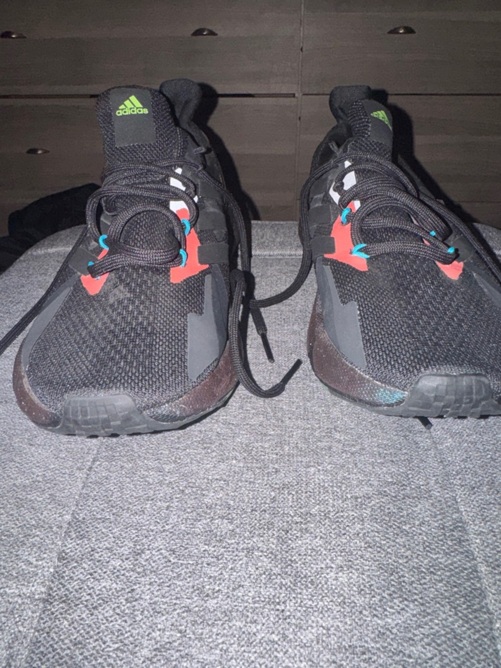 adidas Black Athletic Running Shoes with Red and Green Accents
